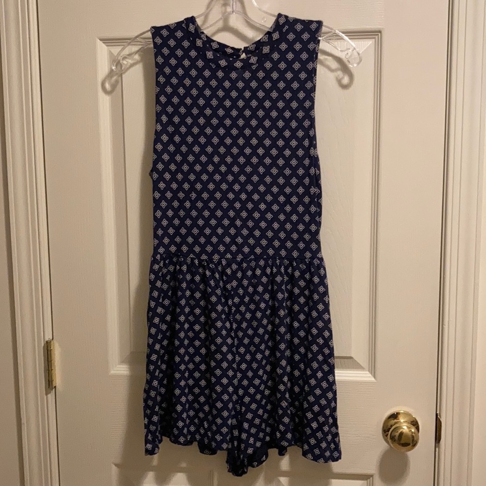 Divided Women’s Navy Blue/White Patterned Romper (size 12)